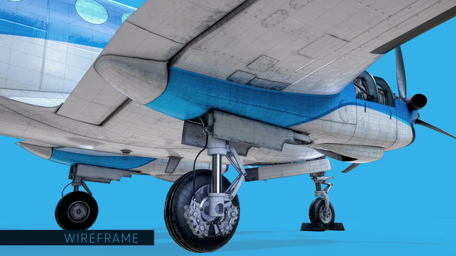 The main landing gear and wing underside with the wireframe overlaid.