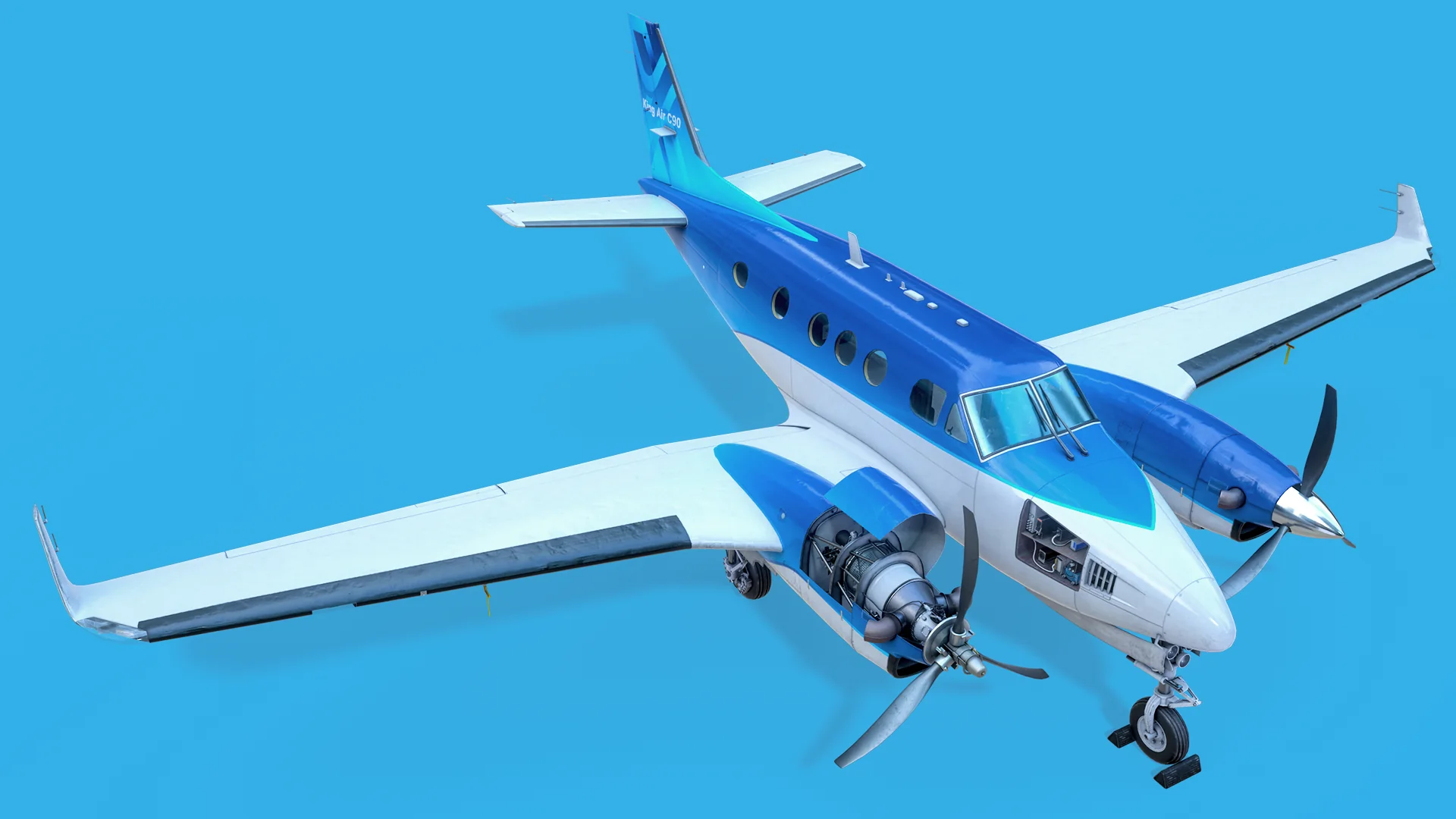 Full King Air C90 seen from a high three-quarter angle, left engine cowling open to reveal the PT6.