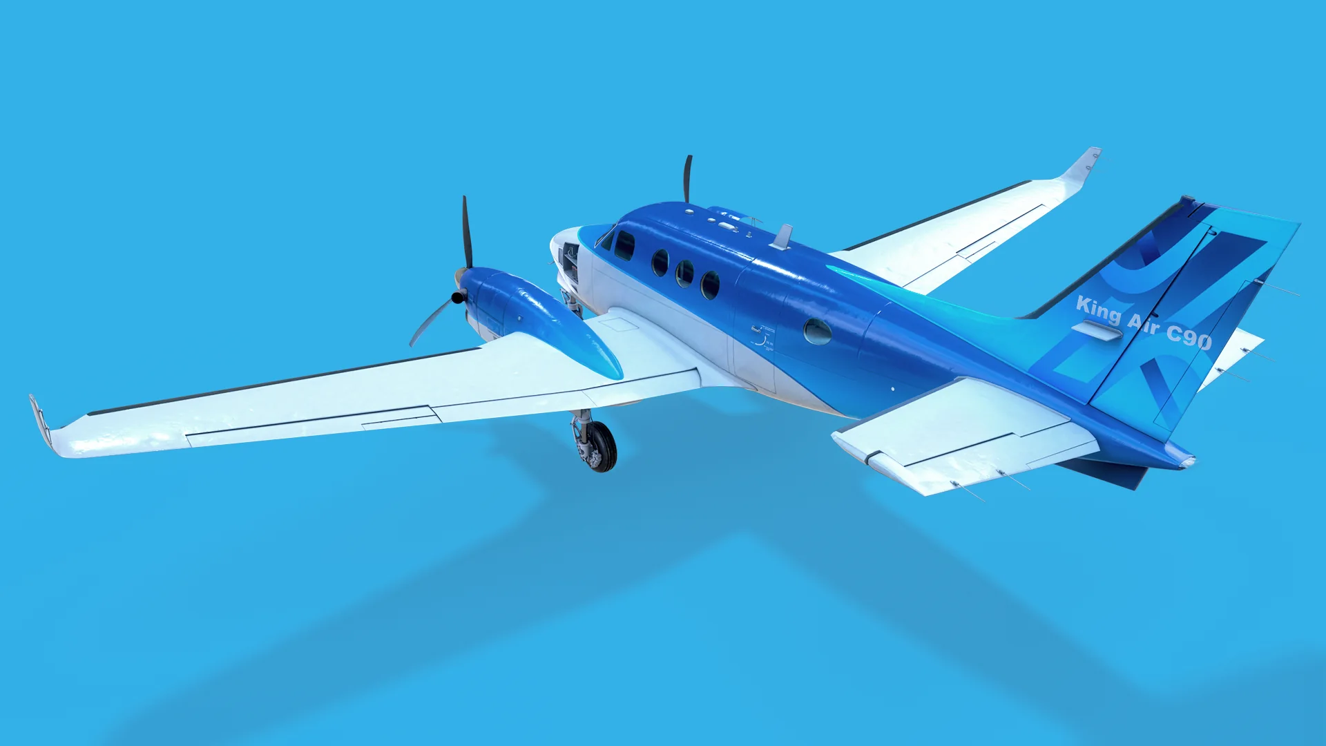 King Air C90 from a high rear three-quarter angle, showing the tail with the King Air C90 livery.